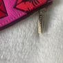Skinny Dip clutch handbag pink and kiss pattern Image 3
