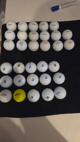 32 Titleist and Bridgestone balls