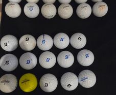 32 Titleist and Bridgestone balls