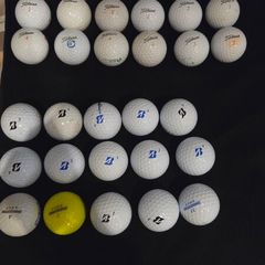 32 Titleist and Bridgestone balls