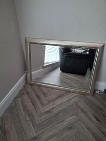 Chrome/gold framed mirror