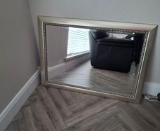 Chrome/gold framed mirror