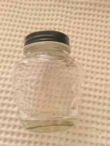 Old glass brylcreem bottle