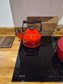 Red le creuset kettle