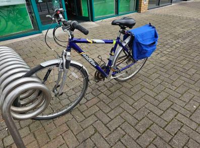 Hybrid bike with many accessories.