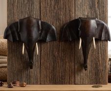 matching pair of hand-carved wooden elephant head