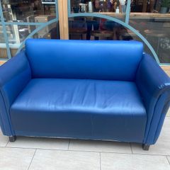 2 two seater leather sofas.