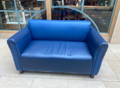 2 two seater leather sofas.