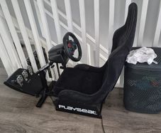 Logitech PlayStation steering wheel and chair