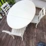 Antique Oval drop leaf table with claw legs and four chairs Image 3