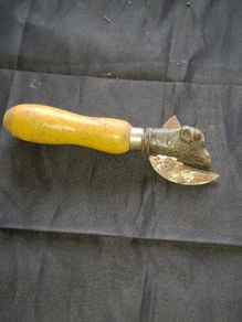 Antique Cast Iron Bulls Head Can Opener, often referred to as a Bully Beef Opener