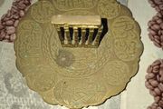 Vintage Middle Eastern or Levantine decorative Brass trinket dish featuring embossed Arabic script and a central colonnade motif depicting historic ruins such as the Baalbek Roman ruins or the Jerash Oval Plaza columns.
