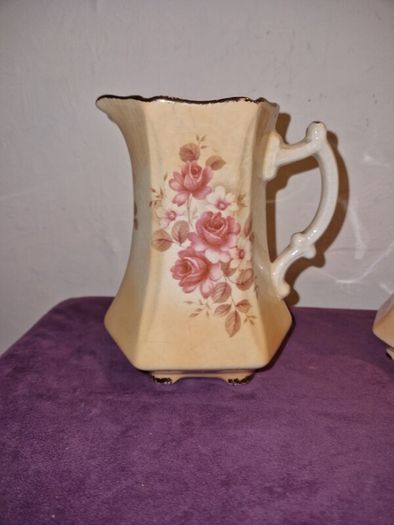 Antique pair of Rockingham Staffordshire floral jugs
