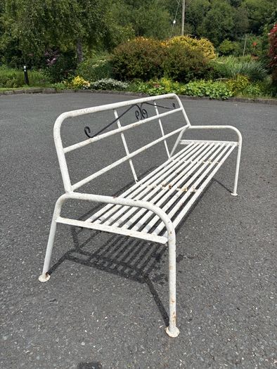 A matching pair of vintage tubalar steel garden benchs c1950