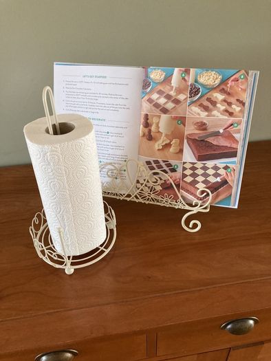 cook book and kitchen roll holder.