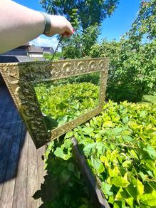 Vintage brass embellished mirror