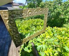 Vintage brass embellished mirror