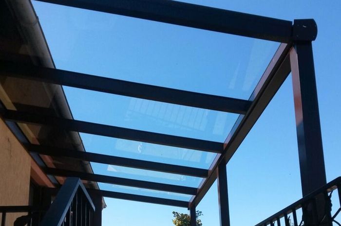 Tempered glass pergola with sliding door