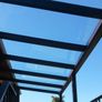 Tempered glass pergola with sliding door Image 7