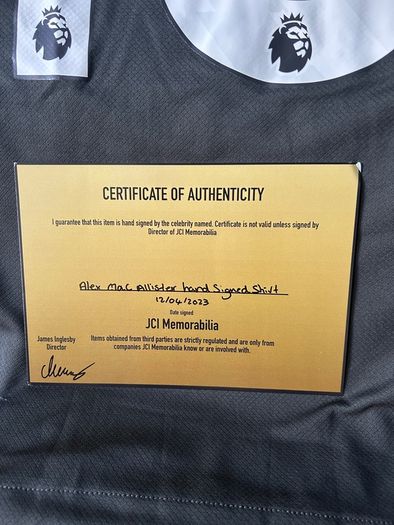 Mac Allister signed Liverpool jersey