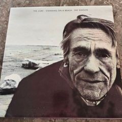 The Cure -; Standing on a Beach