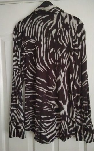 Blouse. Size: Large UK