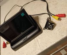 car reverse camera and monitor flip to close when need. All cables and easy to install on reverse positive cable and ground metal part of the car.