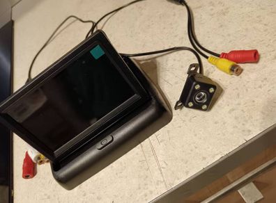 car reverse camera and monitor flip to close when need. All cables and easy to install on reverse positive cable and ground metal part of the car.