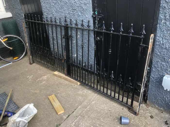 Set of wrought iron driveway gates and side gate