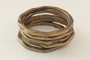 Ring worn as 5 rings together