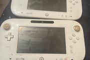 A pair of faulty Wii U game pads.