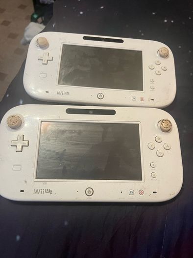 A pair of faulty Wii U game pads.