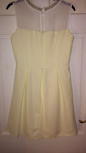 Dress with pearl neckline