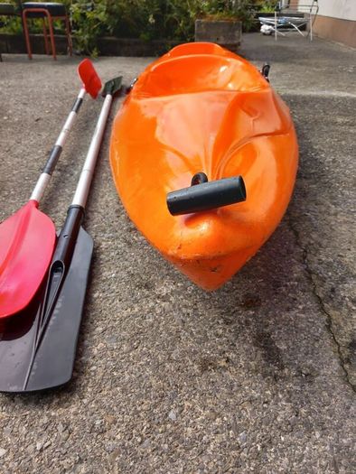 Kayak plus 2 paddles and 2 bouyancy aides