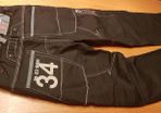 Jeans black denim Next with big back pockets white stitch and print details loose fit brand new pants trousersheight 140cm 10years