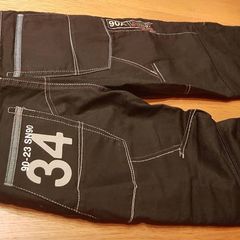 Jeans black denim Next with big back pockets white stitch and print details loose fit brand new pants trousersheight 140cm 10years