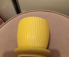 Yellow ribbed plant pot