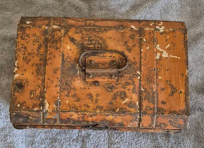 Small vintage metal trunk.