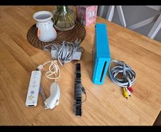 Nintendo Wi console in blue.