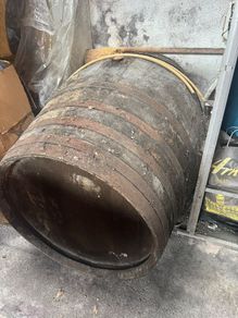 Large oak barrel with iron hoops, planter or bar table