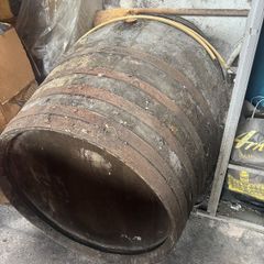 Large oak barrel with iron hoops, planter or bar table