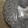 Vintage Ornate Silver-Tone Hand Mirror Floral Embossed Design. Image 4