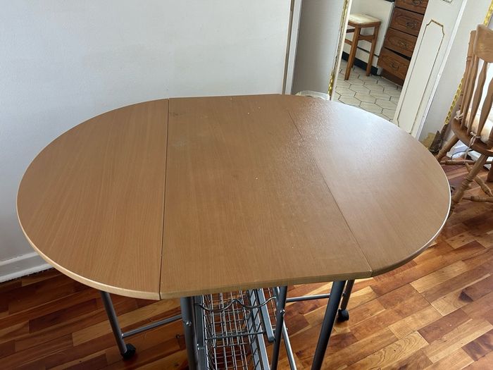 small kitchen table on wheels and with storage