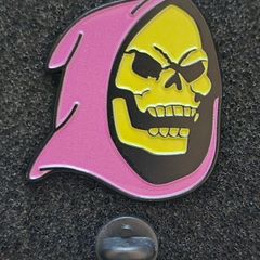 Skeletor, pin back badge.