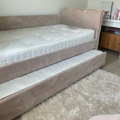 Bed with a guest bed
