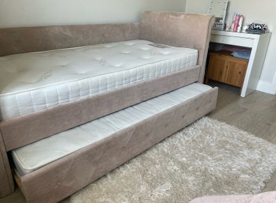 Bed with a guest bed