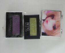 Eyeshadows and small folding mirror