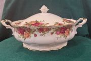 Old country roses covered vegetable dish
