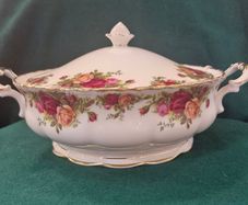 Old country roses covered vegetable dish