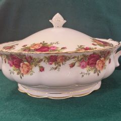 Old country roses covered vegetable dish
